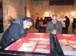 Hakan Cakmak and Zeki Ali studying the private letters